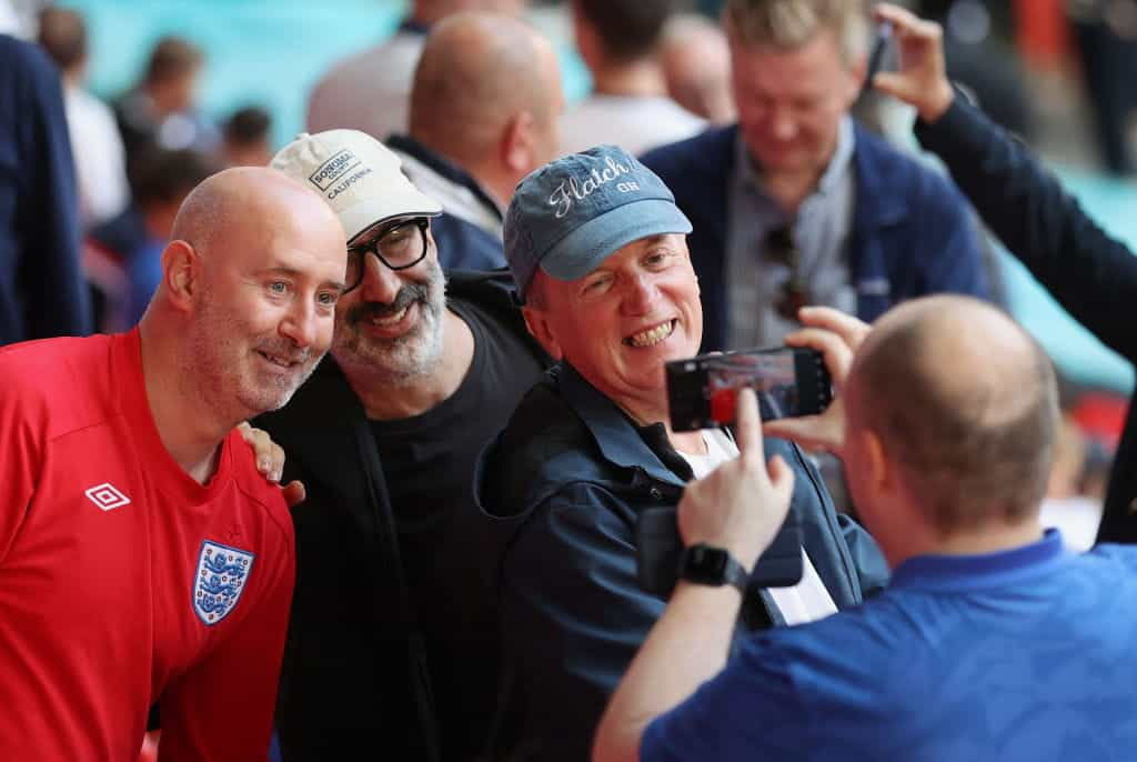 David Baddiel and Frank Skinner meeting fans at an England game.