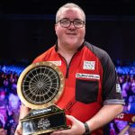 Darts player Stephen Bunting with his 2024 Masters trophy.